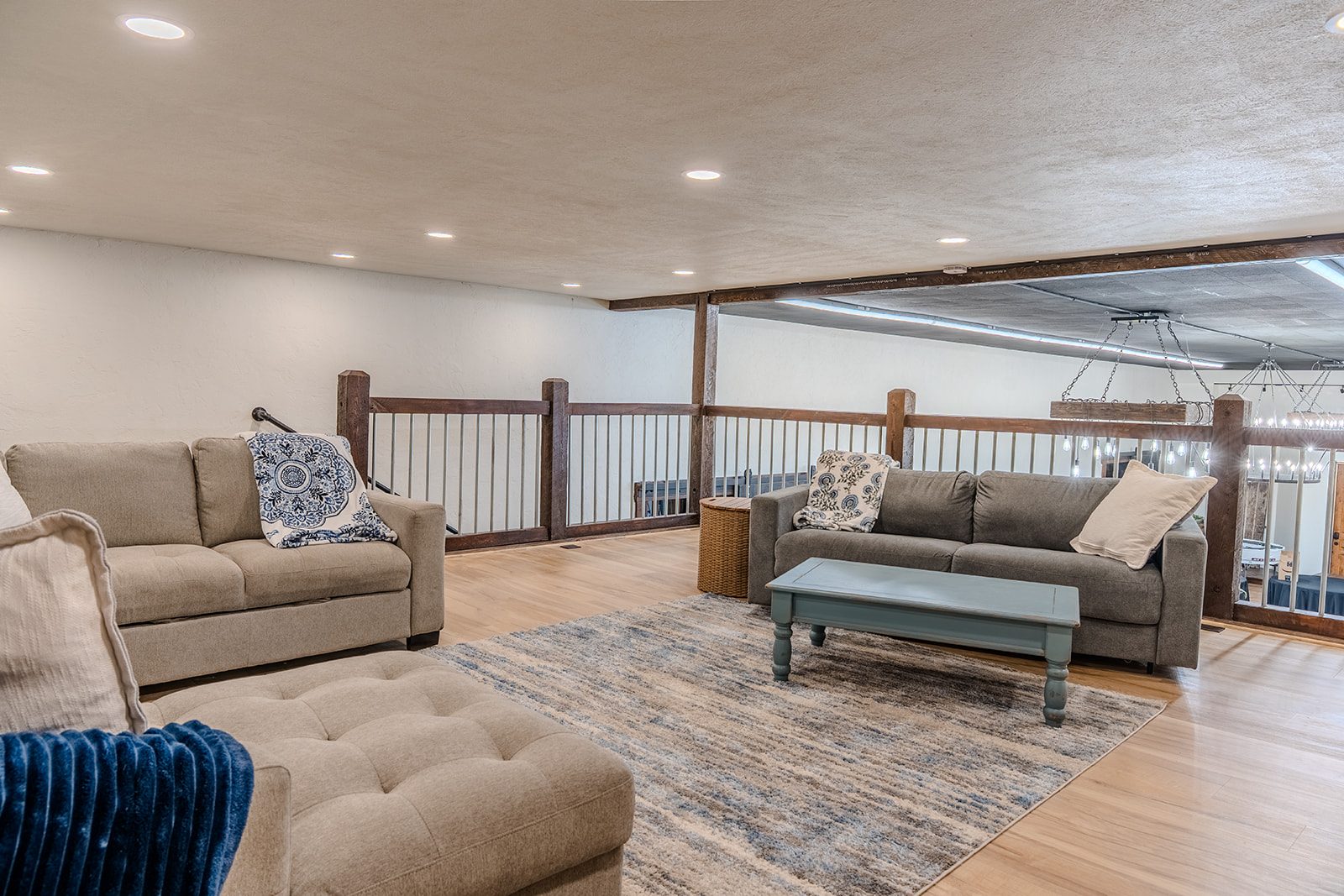 Upstairs lounge with sectionals overlooking the ballroom