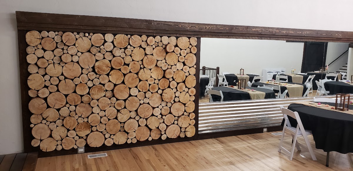 Stacked firewood feature wall in the ballroom